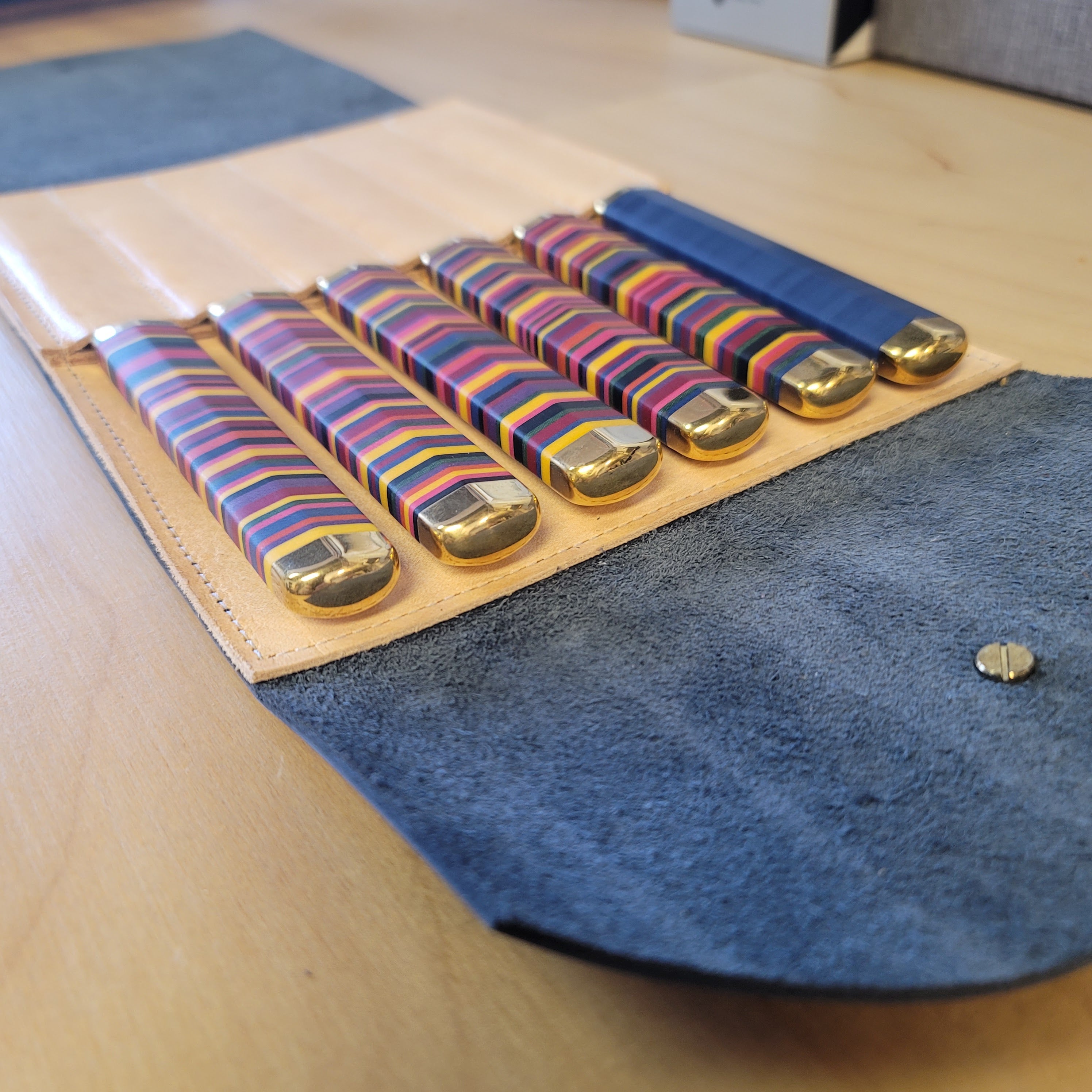 Custom Savilino knife holder in blue leather