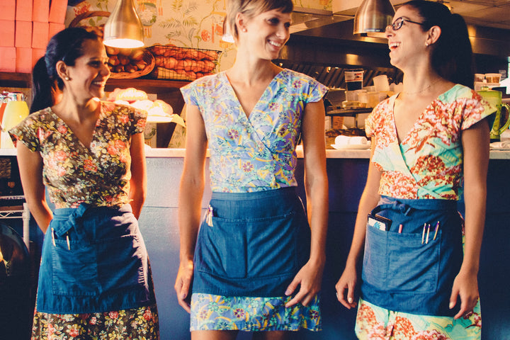 Elizabeth St. Cafe waitresses wearing printed dresses sewn by Savilino 