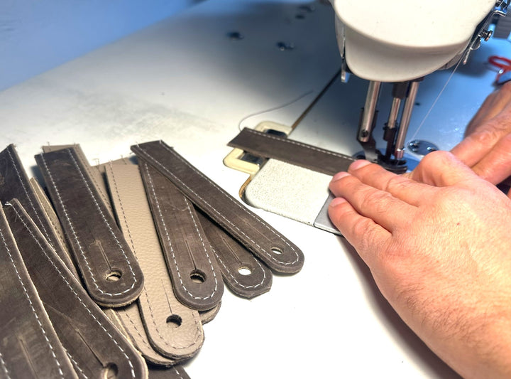 Leather being sewn in the Savilino studio