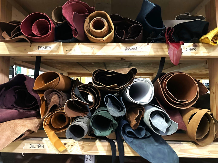 Rolls of different styles of leather in the Savilino studio