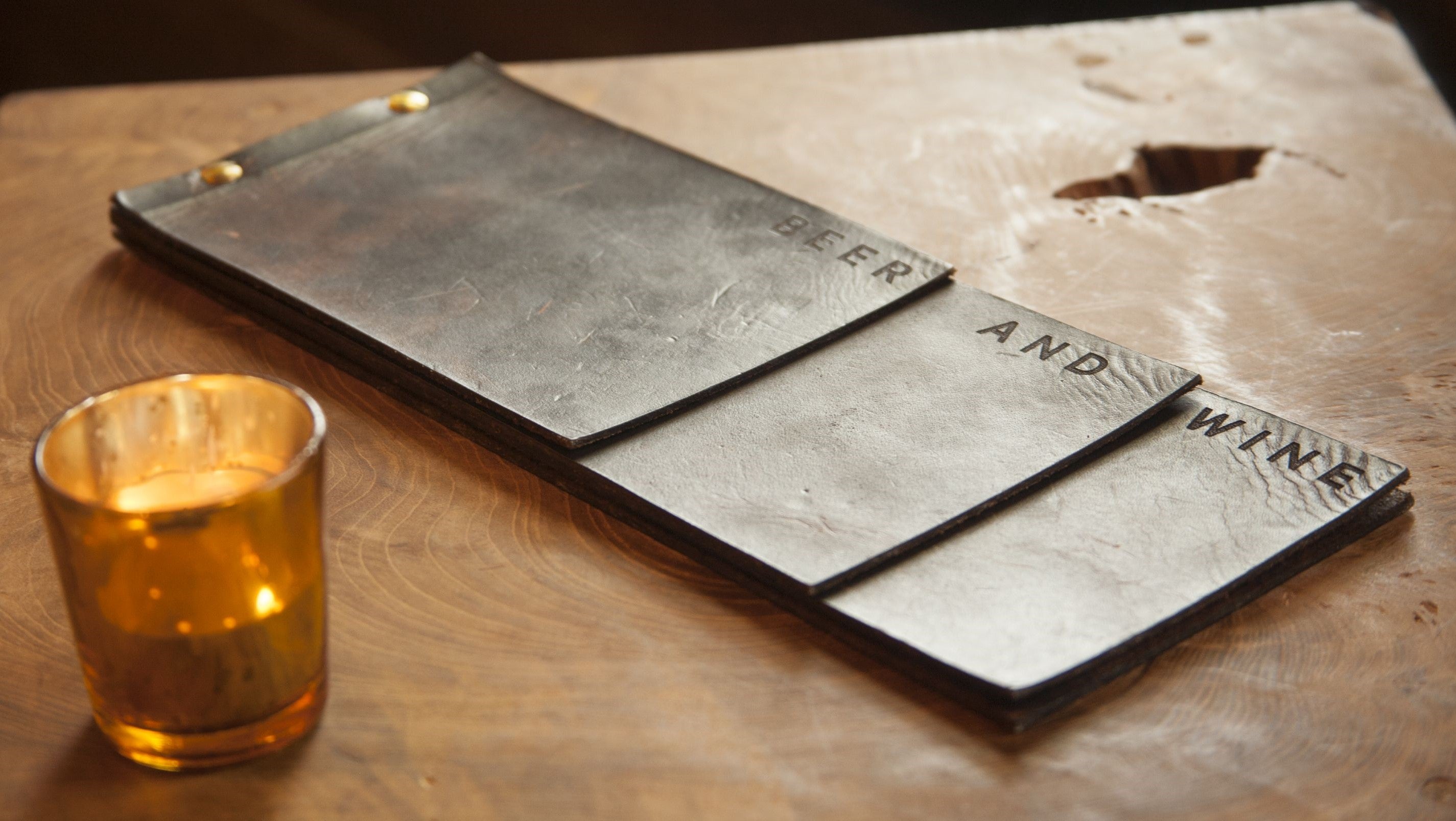 Custom leather beer and wine menu by Savilino