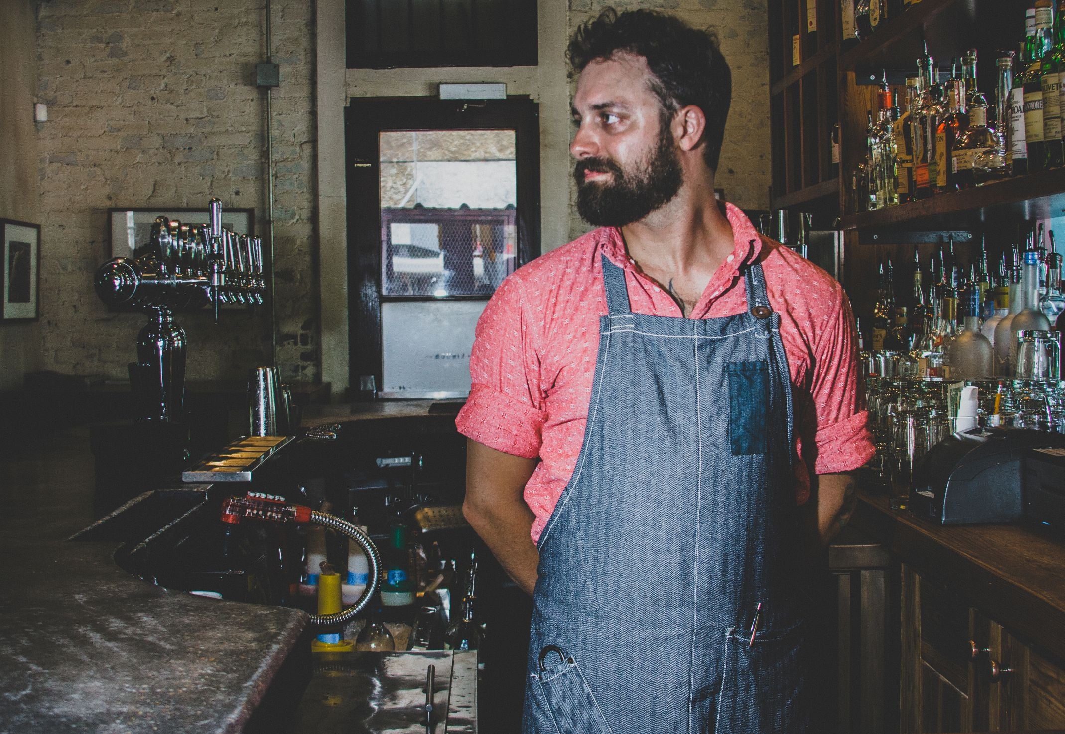Savilino bib apron worn behind the bar