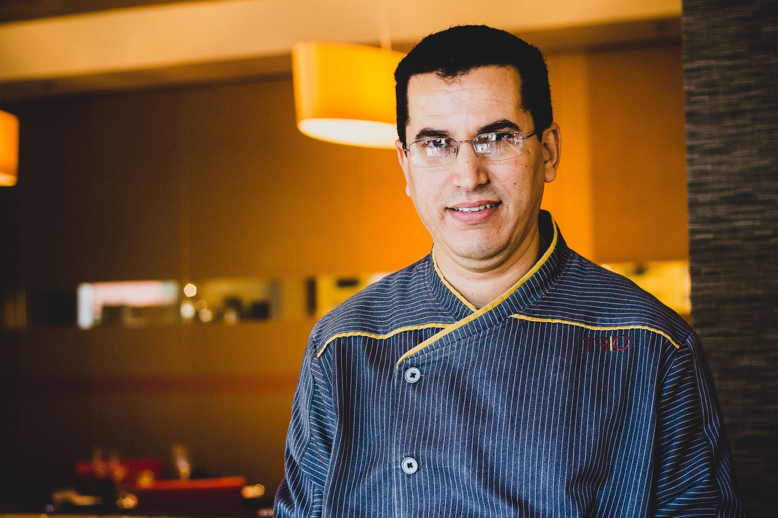 Man wearing uniform provided by Savilino